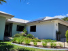 Tewantin house exterior - green, white and grey