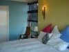 warm yellow with blue bedroom